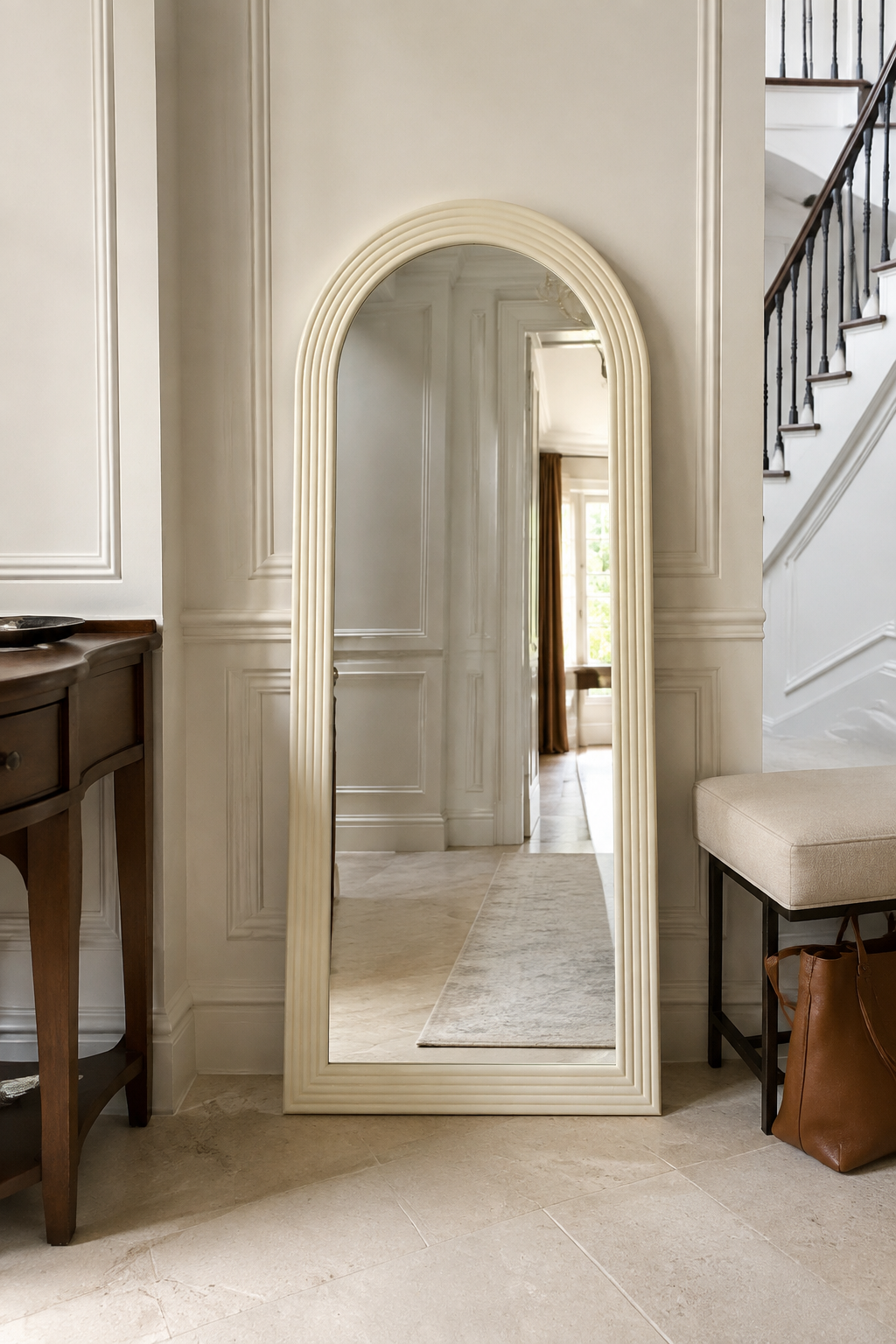 Roman arched floor mirror in an interior setting